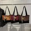 Bolso Cubo de Color Contrastante de Moda para Exportación Transfronteriza Bolso Estilo Retro Bolso Tote de Alta Calidad Maillard para Hombro y Mano