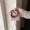 Mini bolso para mujer, nueva colección otoño/invierno 2026, diseño simple, elegante, casual y único, con patrones de encaje y lunares, y una correa cruzada