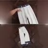 Jeans acampanados para hombre de comercio exterior transfronterizo para primavera y otoño, estilo de calle alto americano, geniales y elegantes, corte limpio, patchwork, pantalones de algodón rectos adelgazantes