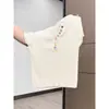 Camiseta de manga corta abotonada de color dopamina estilo coreano para mujer, nuevo top de verano ajustado con cuello en V para un look esbelto y elegante
