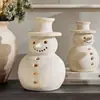 Muñeco de nieve de terracota transfronterizo Muñeco de nieve de resina de color retro Decoración navideña Mesa Muñeco de nieve navideño