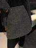 Saia de lã cinza da moda feminina outono e inverno novo estilo coreano all-match cintura alta emagrecimento saia linha A saia curta transfronteiriça