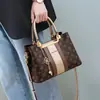 Bolso de mano para mujer 2026 nuevo estilo, gran capacidad, versátil para el trabajo, hombro cruzado para mamás