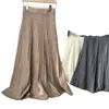 Saia midi plissada de tricô branca para mulheres, nova coleção outono/inverno 2026, cintura elástica, silhueta evasê, barra fluida, design de cauda de peixe, moderna
