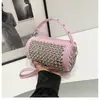 Bolsa de Mano Popular de Comercio Exterior para Mujer 2024 Nuevo Bolso de Hombro Coreano con Remaches Bolso Cruzado Cilíndrico Personalizado de Moda