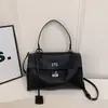 Primavera 2026 Nuevo Estilo Europeo y Americano Simple Gran Capacidad Casual Hebilla de Cierre Bolso Grande de Moda Tendencia Bolso de Hombro Cruzado para Mujer