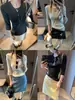 Além disso, a nova camisa de malha de manga média slim fit com gola henley de botões e meia-plaquete estilo coreano outono MQ1710