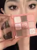 Muge Leen Paleta de Sombras de Ojos de Nueve Colores Mate Perlado Polvo Ahumado Rosa Color Melocotón Tierra Color Té con Leche Asequible Paleta de Sombras de Ojos Ins