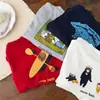 Camiseta de Manga Larga T2026 para Niños con Ojos Entrecerrados, Nuevo Producto de Otoño, Unisex con Estampado de Dibujos Animados en la Parte Delantera y Trasera, Camiseta Básica Versátil para Bebé