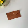 Nuevo en Stock al por Mayor Color Sólido Cuero Cartera Pequeña Porta Pasaporte Estilo Ins Sobre Billetera para Monedas Piel Sintética Almacenamiento para Gafas