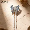 Elegante pasador de pelo coreano estilo mariposa azul hielo medio recogido con un toque de alta gama, hecho a mano con cuentas y borlas de cristal, pinza de tiburón para mujer