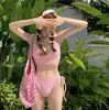 Nuevo traje de baño sexy de dos piezas europeo y americano para mujer que cubre el abdomen, adelgazante, para pecho pequeño, push up, bikini conservador, traje de baño para aguas termales