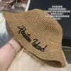 Sombrero de Paja Tejido con Bordado de Letras Estilo Nuevo 2026 para Mujer, Sombrero de Sol para Playa Primavera y Verano, Sombrero de Pescador Versátil de Nicho que Hace que la Cara Parezca Más Pequeña
