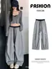 Calça de moletom feminina cinza estilo americano, nova coleção outono 2026, corte solto e relaxado, cintura alta, com cordão, calça de perna larga estilo paraquedas