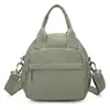 Bolsa de mão multicamadas em nylon, bolsa transversal para homens e mulheres, mochila multifuncional de três vias, simples e leve, adequada para o dia a dia e viagens, bolsa de ombro