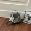 Estilo universitario transfronterizo 2026 nuevo modelo gran capacidad retro moda simple casual bolso de mano mochila bolsa cuadrada pequeña para mujer