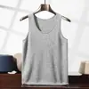 Camiseta de punto de cachemira lisa para hombre con cuello en U y doce puntadas, sin mangas, capa interior, cómoda, amigable con la piel, jersey