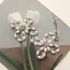 Japonés y Coreano Simple Versátil Perla Artificial Cristal Lazo DIY Bolsa Colgante para Teléfono Hebilla de Zapato Flor de Zapato Accesorios para Pendientes