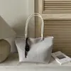 Bolsa com Textura Trançada Feminina 2026 Nova Tendência Outono Retrô Merade Bolsa de Ombro Único para o Dia a Dia Bolsa Tote de Grande Capacidade
