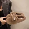 Otoño Invierno 2026 Nuevo Moda de Celebridad de Internet Versátiles Pantuflas de Piel para Mujer Pantuflas de Exterior de Punta Cerrada Pantuflas de Algodón con Suela Gruesa y Moño