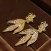 Pendientes de Borla de Flor de Zirconia Chapados en Oro de Cobre 14K S925 con un Toque Lujoso y Sofisticado, Pendientes Exquisitos