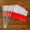 Banderas de mano con mástil en stock transfronterizas de todo el mundo, hechas a medida según su diseño, Banderas coloridas de poliéster para la Copa del Mundo de EE. UU.-Canadá-México