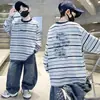 Sudadera de Rayas y Bloques de Color para Niños Primavera 2026 Nuevo Estilo Primavera/Verano Camisa Base Holgada para Niños Tendencia de Venta al por Mayor Transfronteriza