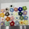 Flor de lana al por mayor flor pompón linda crochet hecho a mano flor de algodón de leche estilo deslumbrante elegante accesorios de ropa