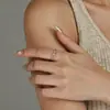 Anillo de Plata de Ley S925 Símbolo Infinito Corazón Diseño de Lujo Ligero Europeo y Americano Nicho Incrustado Zirconia Anillo de Dedo Entrelazado Suministro Exclusivo Transfronterizo