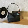 Bolso hobo de cuero suave tejido único para mujer, nuevo modelo de verano 2026, simple y versátil para el trabajo, bolso de mano y bolso de hombro