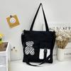Bolsa de Lona Fashion 2026, Bolsa de Ombro Cartoon Doce e Fresca Estilo Coreano Literário, Bolsa Tote de Grande Capacidade para Estudantes Universitárias