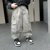 Overol para Niños Primavera/Otoño 2026 Estilo Nuevo Niños Holgado Fresco Guapo Estilo Calle Casual Deportes Pantalones de Pierna Ancha Moderno