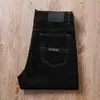 Jeans masculino reto fino respirável de algodão puro, micro elástico, cintura média, preto liso, novo para o verão, negócio