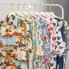 Camisa floral retro de estilo Hong Kong 12V, manga corta, estilo tailandés hawaiano, ideal para hombres y mujeres.