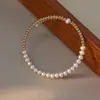 Pulsera de Cuentas Doradas de Acero de Titanio Redonda Plana de Perlas de Agua Dulce Temperamento Celebridad Cibernética Anillo Elástico Pulsera Regalo de Cumpleaños Pulsera de Perlas para Mujer