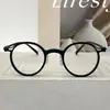 Gafas transparentes de moda estilo Blackout Storm con montura redonda de TR90, monturas de gafas de alta gama retro punk modernas para mujeres y hombres