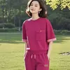 Moda Esportiva Casual e Estilosa de Verão 2025 Gola Redonda Vermelho Rosa Contrastante Branqueador Conjunto Casual de Duas Peças