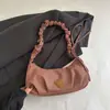 2025 Primavera Casual Nueva Moda Estilo Coreano Ins Trendy Plisado Gran Capacidad Textura Casual Moda Axila Un Hombro Mujeres
