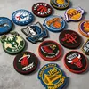 La fábrica de origen elabora expertamente logotipos y emblemas personalizados de equipos de la NBA, sellos de goma de caucho blando de PVC para artículos deportivos