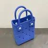 Bolso Perforado de Moda Eva 2026 Nuevo Bolso de Mano Transfronterizo Dopamina Francés Impermeable Almacenamiento Bolso de Playa de Mano