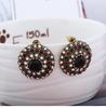 Aretes de aro redondos negros retro europeos y americanos, aretes geométricos de aleación atmosféricos de palacio, ventas directas de fábrica