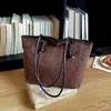 Bolsa Transfronteriza de Gran Capacidad para Mujer Otoño 2026 Nuevo Versátil Moda Hombro Único Tendencia Viaje de Negocios Retro Casual Bolsa de Mano