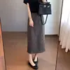 Nueva falda de cuadros de longitud media para otoño para mujer, cintura elástica, abertura trasera, elegante y versátil, falda larga ajustada