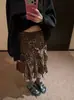Producto auténtico oker. Diseño coreano con un estampado de leopardo irregular, dulce y fresco y dobladillo con volantes, falda de longitud media A1060