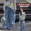 Pantalones cargo de pierna ancha estilo callejero para niña con múltiples bolsillos 2026 nuevos pantalones de moda de otoño para niños street dance hip-hop
