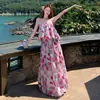 Conjunto de vestido de vacaciones en la playa Nanfa Yunhai: Top de tubo sin hombros + falda larga estampada floral