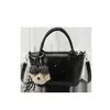 Bolsa de nicho da moda e tendência para mulheres, nova bolsa transversal casual vintage, bolsa transversal pequena quadrada simples estilo coreano