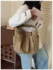 Bolso de lona simple de gran capacidad estilo coreano 2026 nuevo bolso de mano casual bolso cruzado para el trabajo bolso de hombro estilo coreano