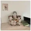 Bolsa de mano grande de encaje bordado estilo chino moderno, modelo nuevo al por mayor para mujer, elegante y atractiva, bolsa tipo tote de gran capacidad, moderna