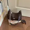 Bolso de Axila con Textura Tejida Simple 2026 Verano Nueva Moda Bolso de Hombro Único para Viajes Cotidianos Bolso Cruzado Elegante